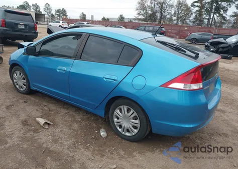 2011 Honda Insight from USA, damaged, VIN JHMZE2H32BS001207